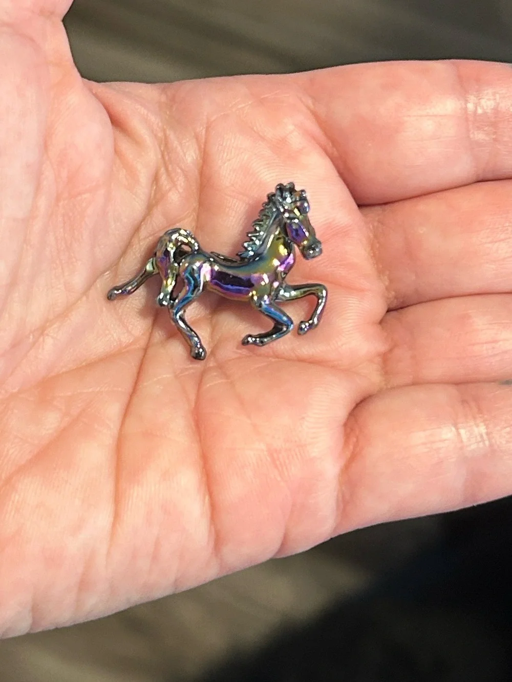 Iridescent horse brooch